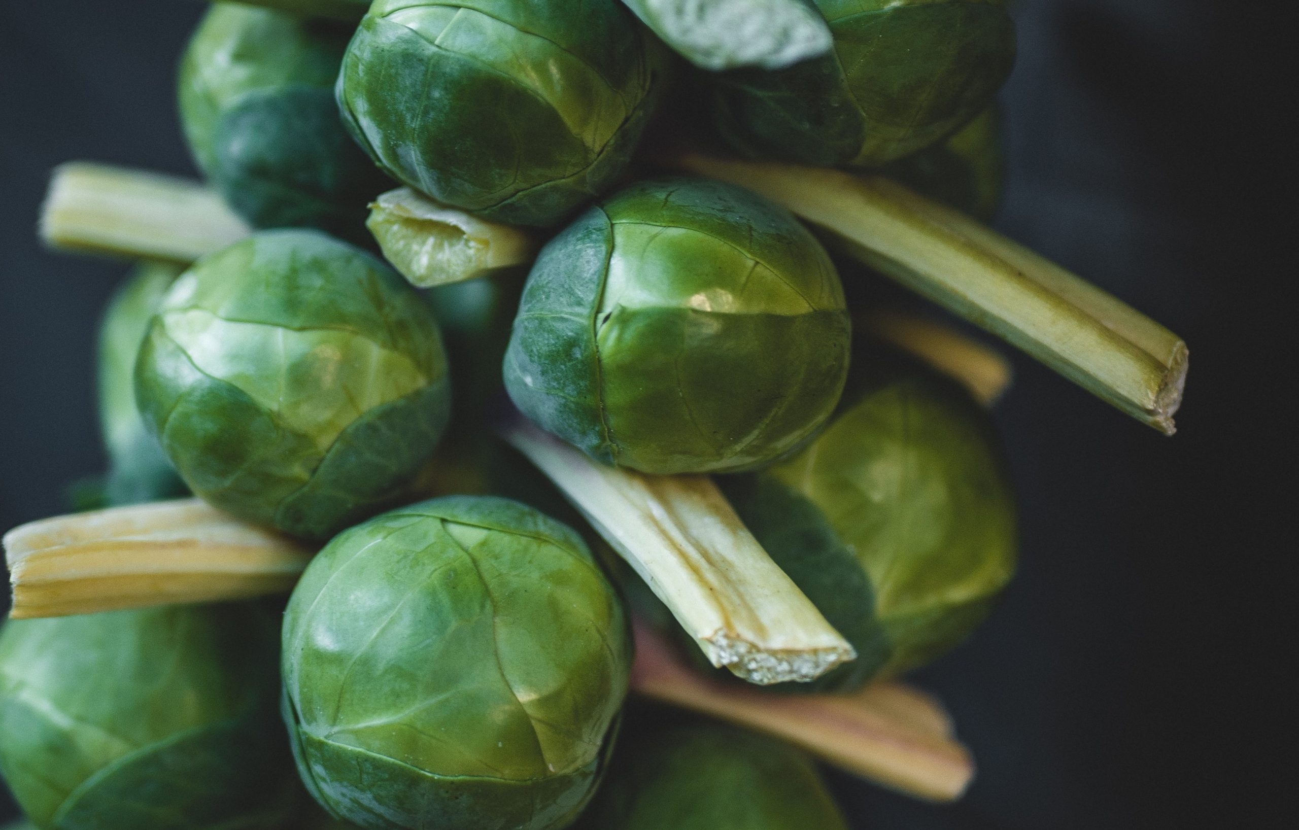 Brussel Sprouts often get a bad rap for being smelly and gross. And to be fair, if you just boil Brussel sprouts they do kinda stink and aren't very appetizing. Maybe that is the way you were served them as a kid. I know, I wasn't a huge fan as a kid. I would drowned my boiled Brussel sprouts in balsamic vinegar to cut the bitter flavor. ⁠ ⁠ Then I discovered new ways to cook Brussel sprouts and now, I absolutely love them. I often roast/bake/airfry them straight from frozen if fresh ones aren't on sale. Add a little cheese and finish with balsamic vinegar and it takes them to a whole new level. ⁠ ⁠ Look how simple this recipe is: ⁠ ⁠ Parmesan Baked Brussel Sprouts⁠ 3 cups halved brussel sprouts⁠ 2 T olive oil⁠ 1 T parmesan cheese⁠ Salt and pepper⁠ Bake at 350 for 20 minutes flip and bake another 5 minutes⁠ ⁠ From a health standpoint, they contain 2 grams of protein and 2 grams of fiber in just 28 calories which is a nice little boost. They are also rich in Vitamin C (important for immunity and inflammation) and vitamin K (important for healthy bones and blood). ⁠ ⁠ As part of the cruciferous family along with cabbage, broccoli, kale, arugula, and cauliflower they also contain phytonutrients. Two of the phytonutrients we know about in Brussel sprouts are luetin which is important for your skin and eyes and glucosinolate which has been shown to have an anti-inflammatory and anti-cancer effect in some studies. That doesn't mean eating these will for sure protect you from any sort of cancer and in fact too much could be problematic. But adding these along with many other vegetables to your diet, can help contribute beneficial nutrients to your body and lead to a healthy lifestyle. ⁠ ⁠ Do you like Brussel sprouts?
